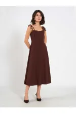 Robe midi en voile à volants 111554