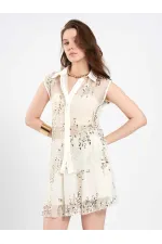 Chemise sans manches à sequins et ornements 080821
