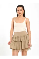 Jupe évasée à détails en dentelle 041180