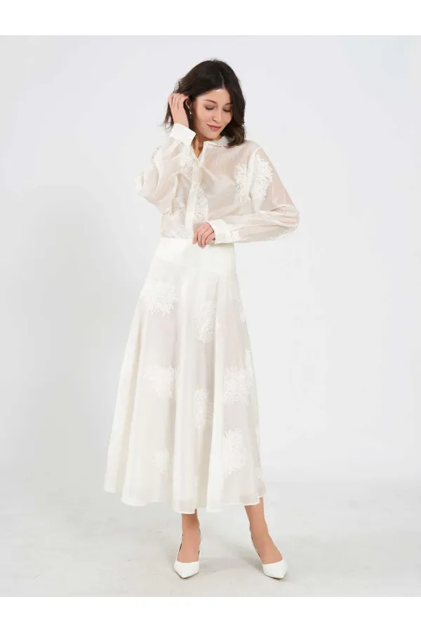 Jupe midi à volants 041192