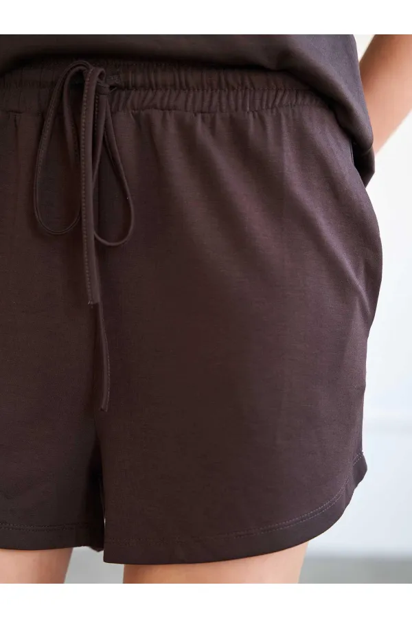 010882 Short mini en maille à taille élastique