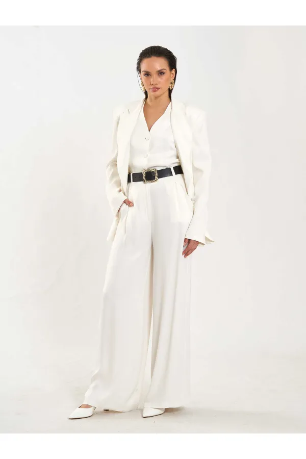 Pantalon à pli unique avec détail de ceinture 031624