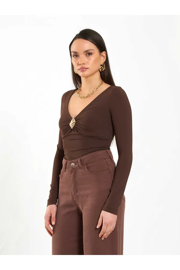 071806 Combinaison à boucle avant