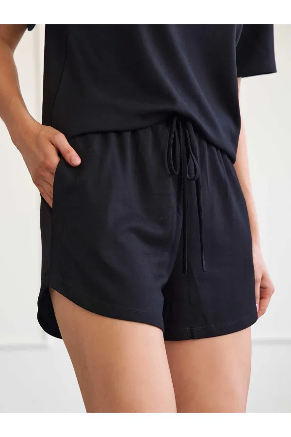 010882 Short mini en maille à taille élastique