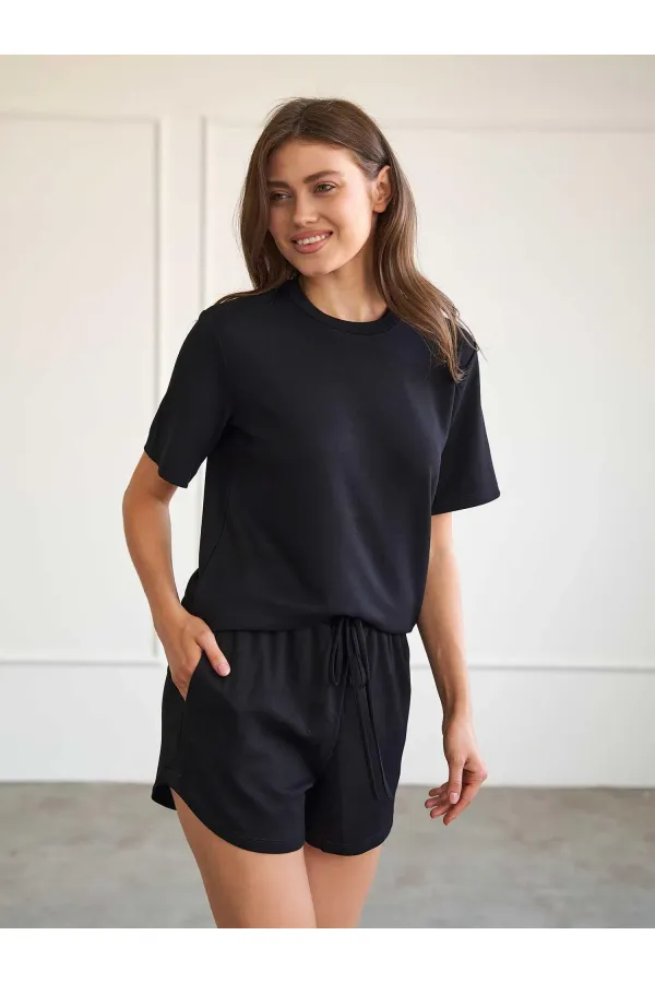 010882 Short mini en maille à taille élastique