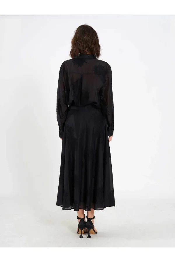 Jupe midi à volants 041192