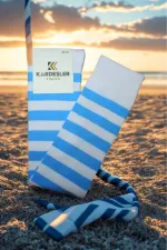 White knee-high cotton socks with blue stripes
