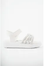 Sandales orthopédiques légères Muggo JAZZ pour filles, conçues pour un usage quotidien, avec détails tricotés et fermeture velcro.