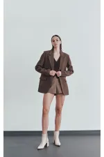 Bottes Muggo CHILY pour femmes, garanties, avec talon épais et détails de ceinture et boucle.