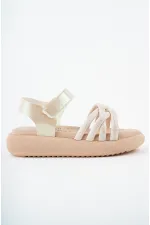 Sandales orthopédiques légères Muggo JAZZ pour filles, conçues pour un usage quotidien, avec détails tricotés et fermeture velcro.