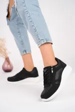 Chaussures de sport confortables et orthopédiques Muggo Asel pour femmes, à lacets et fermeture éclair latérale.