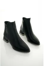 Bottes Muggo SHANE pour femmes, garanties, avec détail métallique au talon et fermeture éclair.