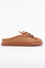 Mocassins Muggo FRINGE en daim, bout fermé, à pampilles et nœud décoratif.