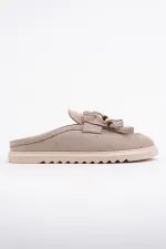 Mocassins Muggo FRINGE en daim, bout fermé, à pampilles et nœud décoratif.