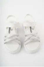 Sandales orthopédiques légères Muggo JAZZ pour filles, conçues pour un usage quotidien, avec détails tricotés et fermeture velcro.