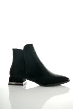 Bottes Muggo SHANE pour femmes, garanties, avec détail métallique au talon et fermeture éclair.