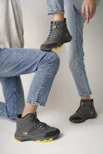 Bottes d'hiver unisexes Muggo Alaska, garanties pour la randonnée en plein air, à lacets et fermeture éclair latérale.