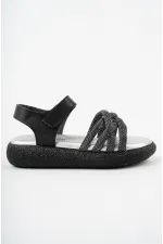 Sandales orthopédiques légères Muggo JAZZ pour filles, conçues pour un usage quotidien, avec détails tricotés et fermeture velcro.