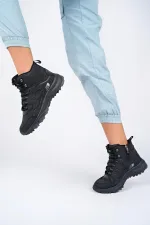 Bottes d'hiver unisexes Muggo Alaska, garanties pour la randonnée en plein air, à lacets et fermeture éclair latérale.