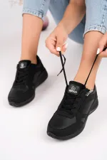 Chaussures de sport confortables et orthopédiques Muggo Asel pour femmes, à lacets et fermeture éclair latérale.