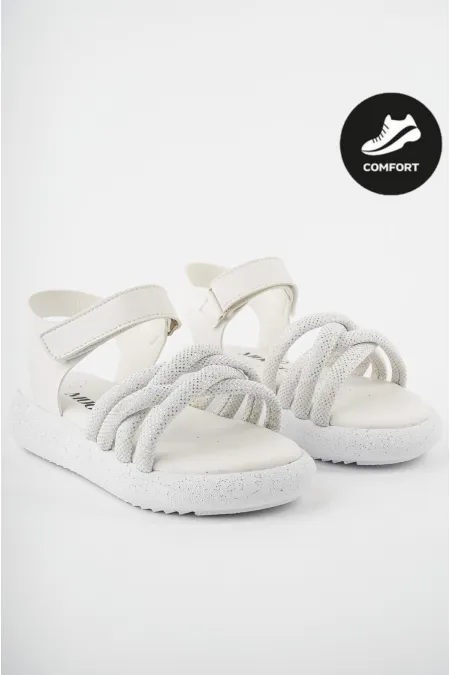 Sandales orthopédiques légères Muggo JAZZ pour filles, conçues pour un usage quotidien, avec détails tricotés et fermeture velcro.