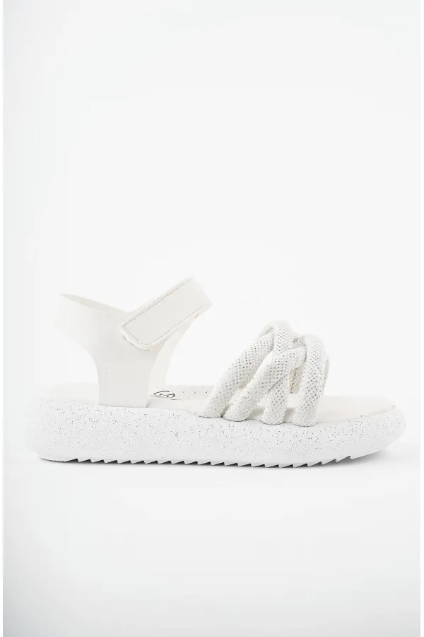 Sandales orthopédiques légères Muggo JAZZ pour filles, conçues pour un usage quotidien, avec détails tricotés et fermeture velcro.