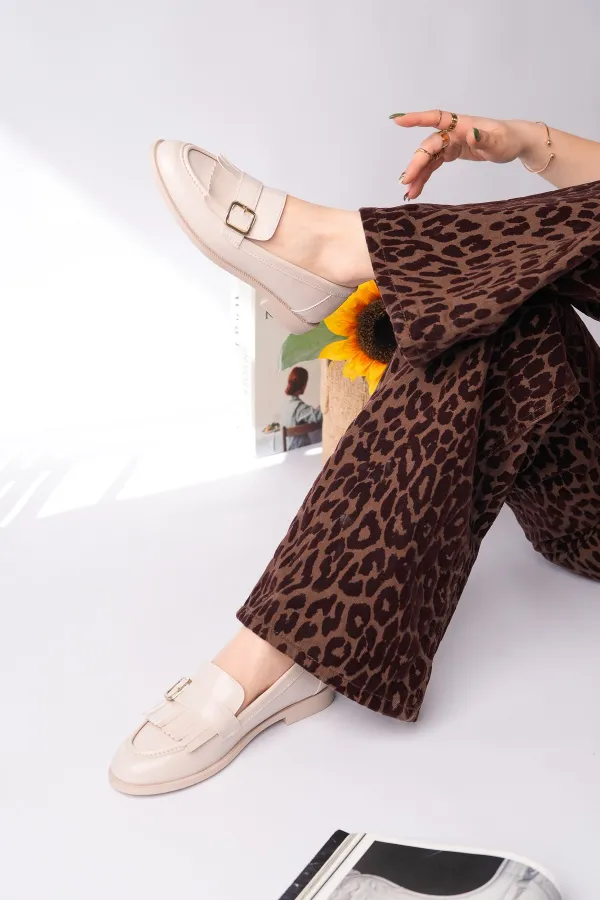 Mocassins décontractés à pampilles et boucle dorée Muggo pour femmes