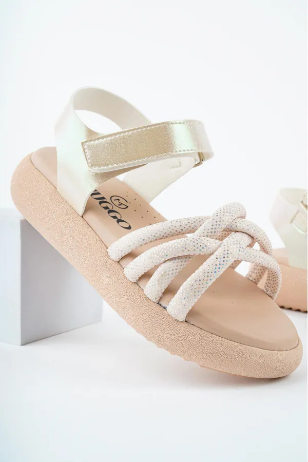 Sandales orthopédiques légères Muggo JAZZ pour filles, conçues pour un usage quotidien, avec détails tricotés et fermeture velcro.