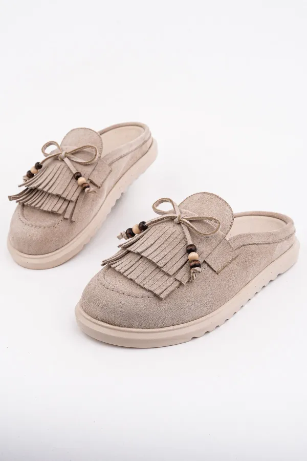 Mocassins Muggo FRINGE en daim, bout fermé, à pampilles et nœud décoratif.