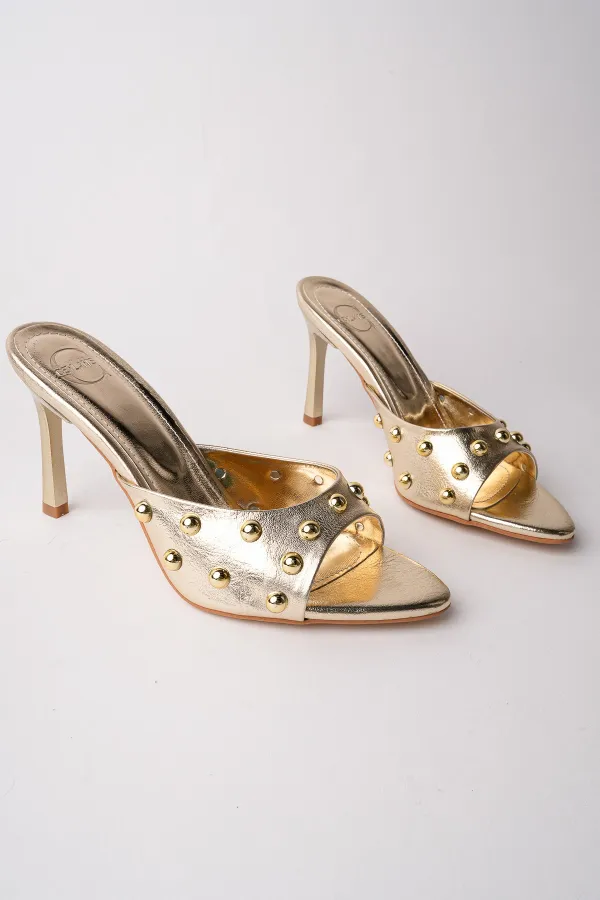 Pantoufles à talons aiguilles Muggo HELENA pour femmes, ornées de clous et de détails métalliques, à bout pointu.