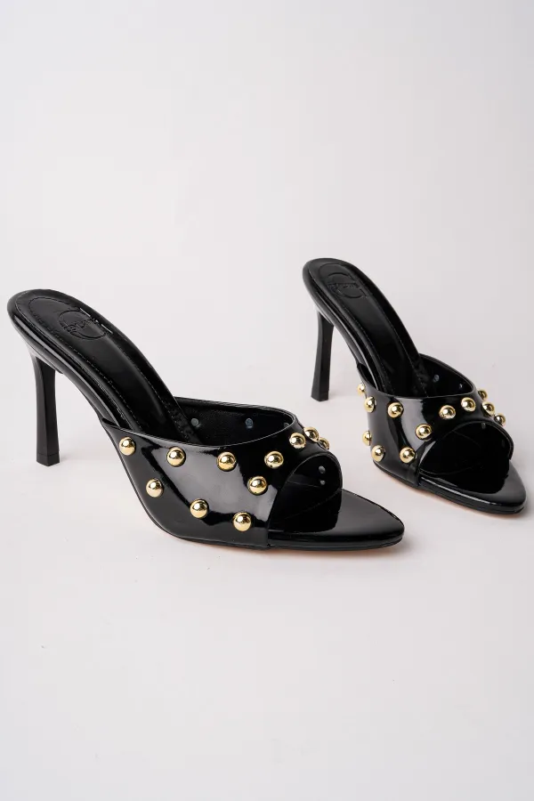 Pantoufles à talons aiguilles Muggo HELENA pour femmes, ornées de clous et de détails métalliques, à bout pointu.