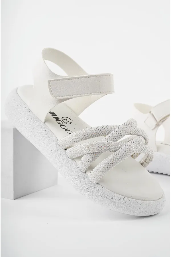 Sandales orthopédiques légères Muggo JAZZ pour filles, conçues pour un usage quotidien, avec détails tricotés et fermeture velcro.