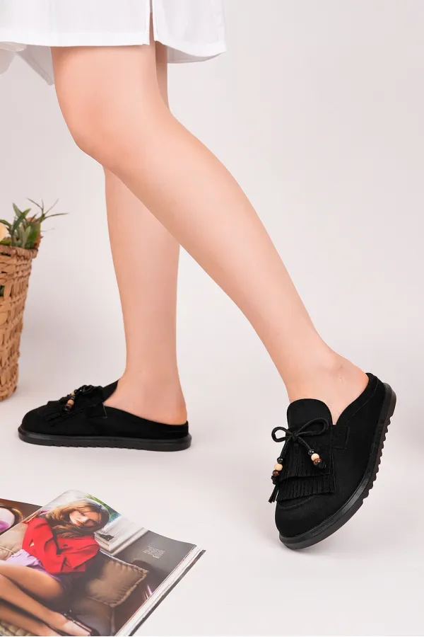 Mocassins Muggo FRINGE en daim, bout fermé, à pampilles et nœud décoratif.