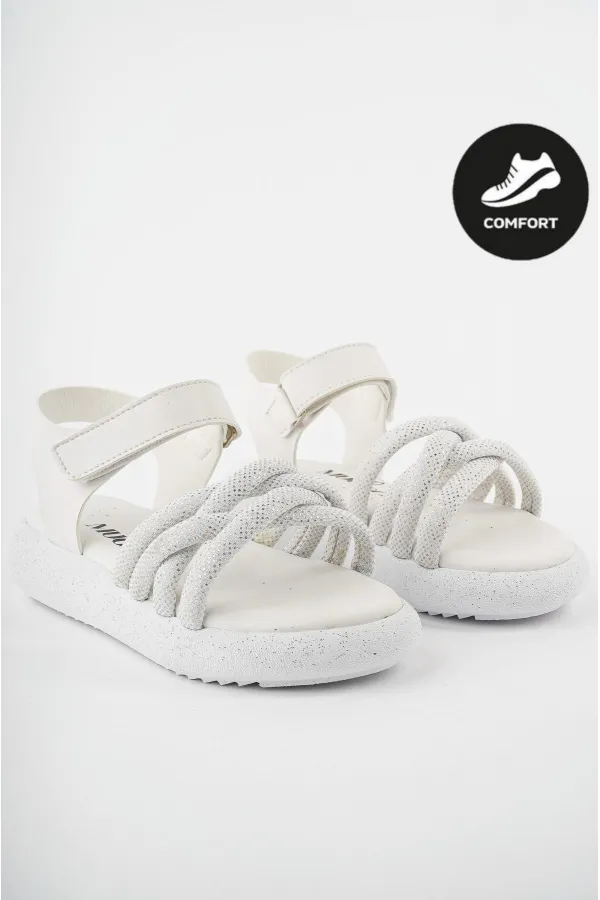 Sandales orthopédiques légères Muggo JAZZ pour filles, conçues pour un usage quotidien, avec détails tricotés et fermeture velcro.