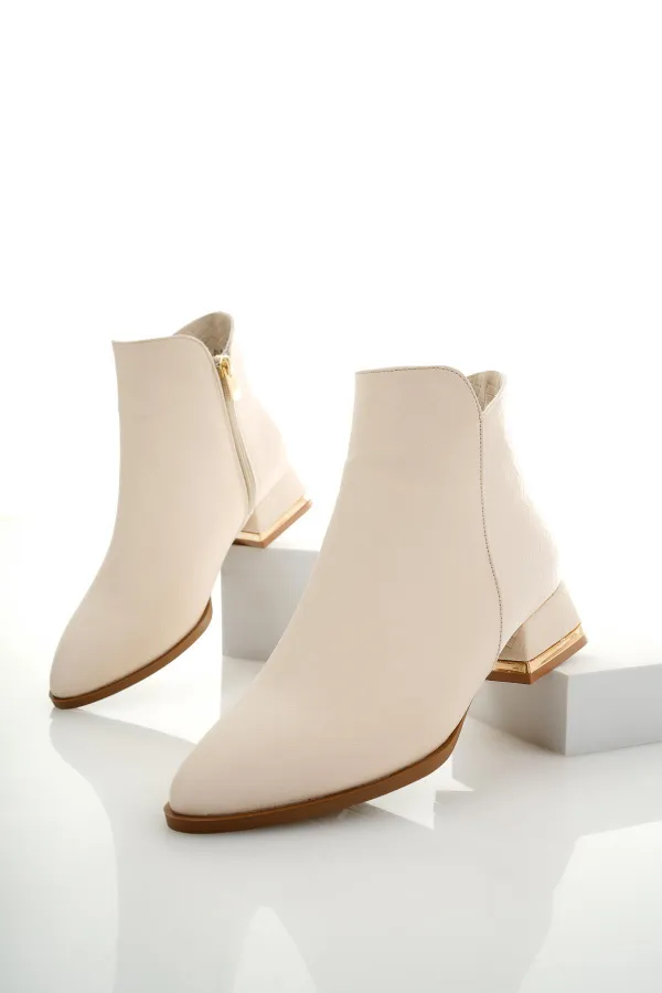 Bottes Muggo SHANE pour femmes, garanties, avec détail métallique au talon et fermeture éclair.