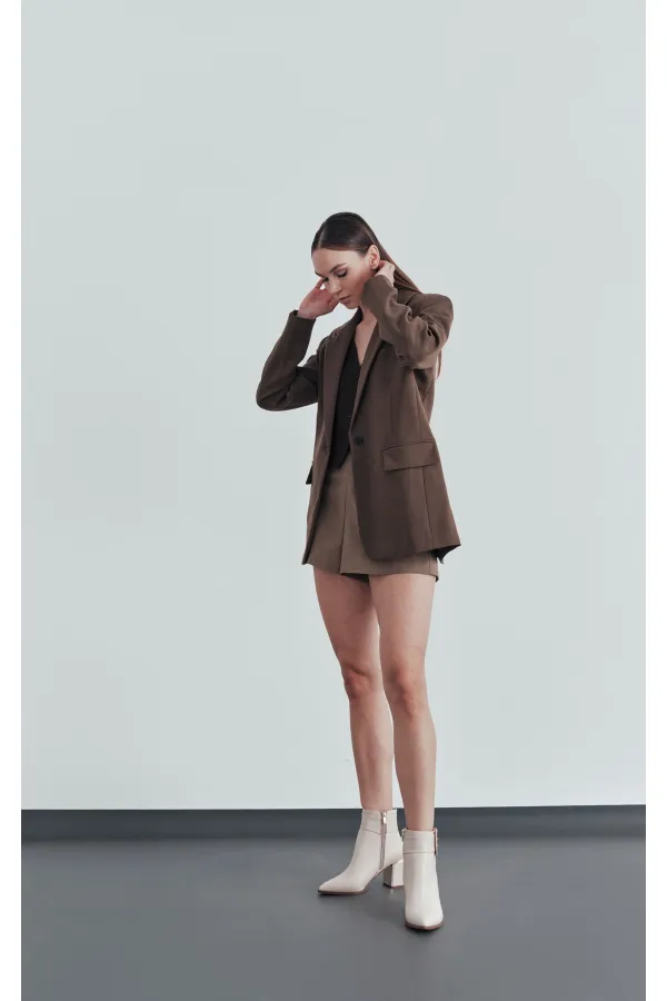 Bottes Muggo CHILY pour femmes, garanties, avec talon épais et détails de ceinture et boucle.