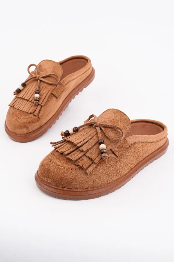 Mocassins Muggo FRINGE en daim, bout fermé, à pampilles et nœud décoratif.