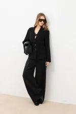 Veste cintrée noire drapée Antioch