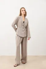 Veste cintrée drapée beige Antioch