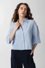 Chemise courte texturée bleue Antioch pour femme
