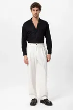 Pantalon Antioch écru à taille haute plissé et coupe décontractée pour homme