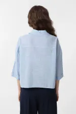 Chemise courte texturée bleue Antioch pour femme