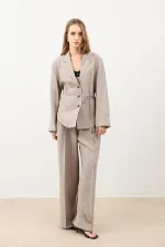 Veste cintrée drapée beige Antioch