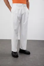 Pantalon Antioch écru à taille haute plissé et coupe décontractée pour homme