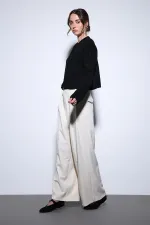 Pull en maille Antioch noir fendu pour femme