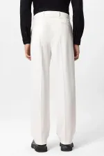 Pantalon Antioch écru à taille haute plissé et coupe décontractée pour homme