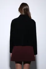 Veste Antioch en daim noir pour femme avec poches plaquées