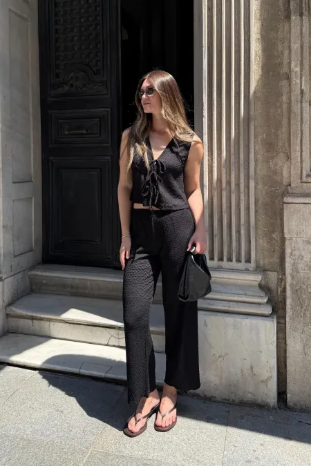 Ensemble tailleur-pantalon noir texturé Antioch pour femme, avec détail cravate