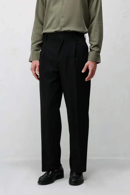 Pantalon Antioch noir à plis et coupe décontractée pour homme