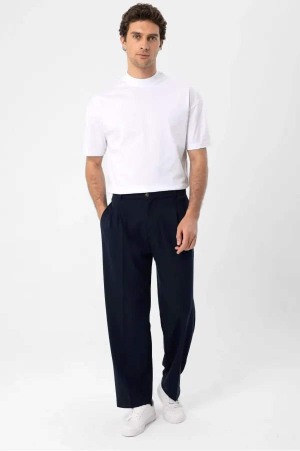 Pantalon homme Antioch bleu marine à taille haute plissée et coupe décontractée